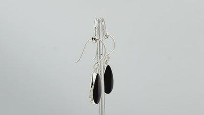 Wholesale Sterling Silver Black Shell pear drop earrings with sleek polished setting and earwire lock handcrafted in Bali.