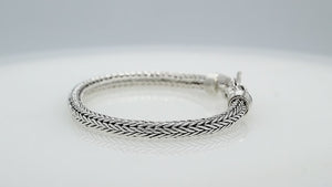 Wholesale sterling silver 5MM woven Bali chain bracelet featuring a decorative lobster lock and polished–oxidized detailing, crafted for premium bulk jewelry inventory requirements.