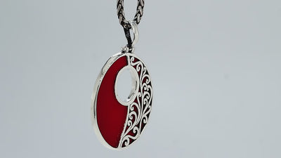 Wholesale sterling silver round Coral Shell pendant with deep red inlay, cut-out design, and Bali-inspired vine silverwork with oxidized detailing, handcrafted artisan jewelry for bulk orders.