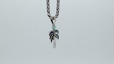 Sterling silver palm tree pendant with abalone shell inlay, handcrafted Bali jewelry for wholesale buyers.