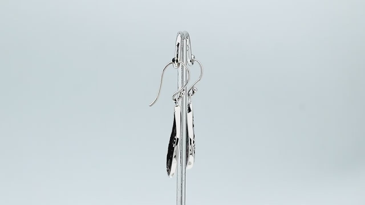 Wholesale sterling silver teardrop earrings with vibrant abalone shell inlay and Balinese scroll detailing, handcrafted in Bali