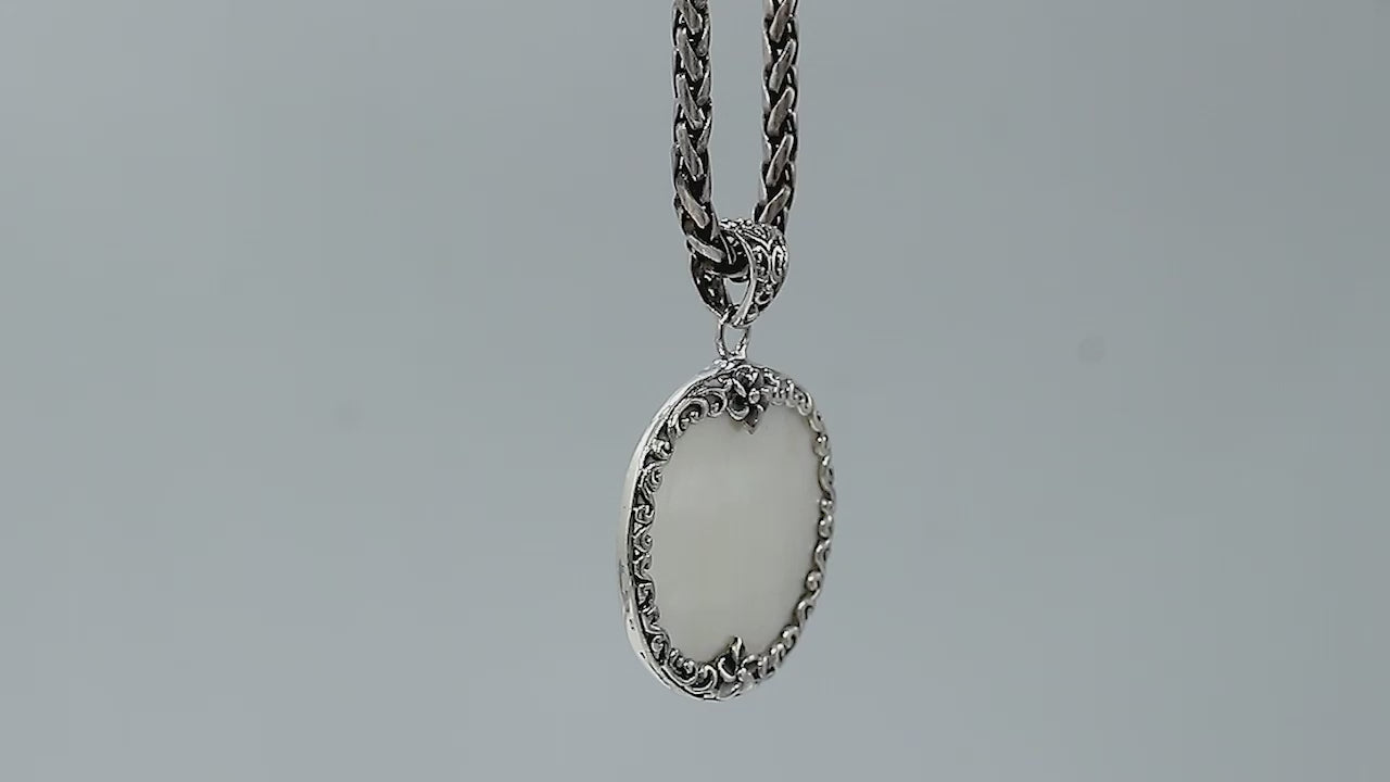 Sterling silver wholesale pendant with round mother of pearl gemstone, floral border design, handcrafted Bali jewelry