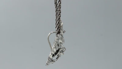 Wholesale sterling silver dragon head pendant with intricate carving, handcrafted Bali artisan jewelry for bulk buyers.