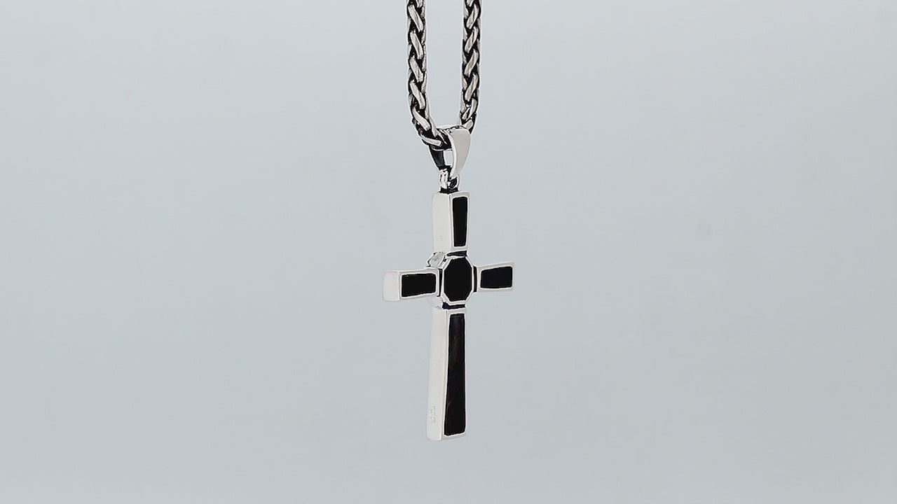 Sterling silver geometric cross pendant with black shell inlay and polished finish