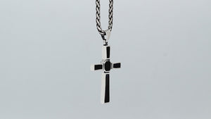 Sterling silver geometric cross pendant with black shell inlay and polished finish