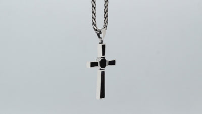 Sterling silver geometric cross pendant with black shell inlay and polished finish