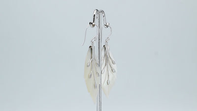 Sterling silver mother of pearl leaf earrings with carved detailing and polished finish