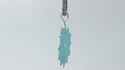 Sterling silver flower pendant with genuine turquoise, handcrafted in Bali with multi-petal design – wholesale gemstone jewelry supplier.