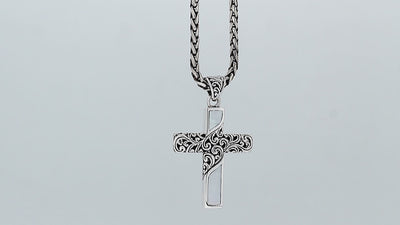 Sterling silver ornate cross pendant with mother of pearl inlay and oxidized scroll detailing