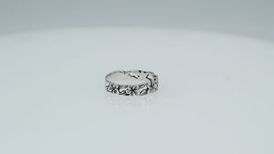 Wholesale sterling silver plumeria flower band ring with leaf motif, handcrafted Bali artisan jewelry for bulk orders and resellers.