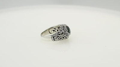 Handcrafted Blue Topaz Quartz oval sterling silver ring with floral detailing from Bali Designs Inc 