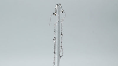 Sterling silver chandelier drop earrings featuring four open teardrop frames, twisted rope borders, small bead accents, articulated tiered construction, and elongated ear wires.