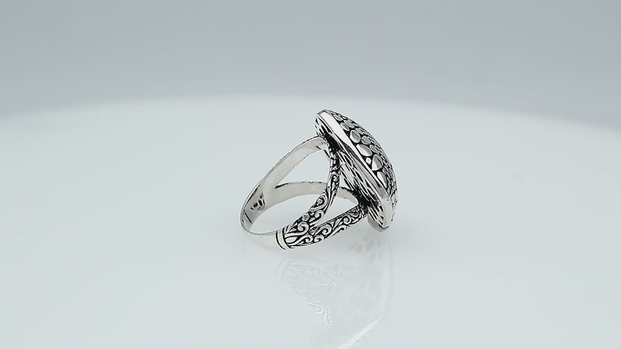 Wholesale sterling silver cushion dome ring with Balinese dot pattern, handcrafted bold artisan jewelry from Bali.