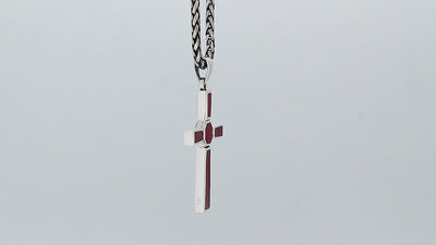 Sterling silver geometric cross pendant with red coral inlay and polished finish