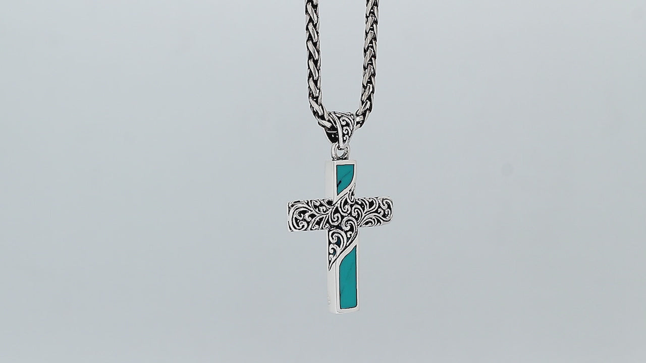 Sterling silver ornate cross pendant with turquoise shell inlay and oxidized scroll detailing