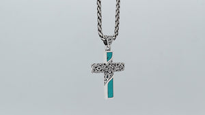 Sterling silver ornate cross pendant with turquoise shell inlay and oxidized scroll detailing