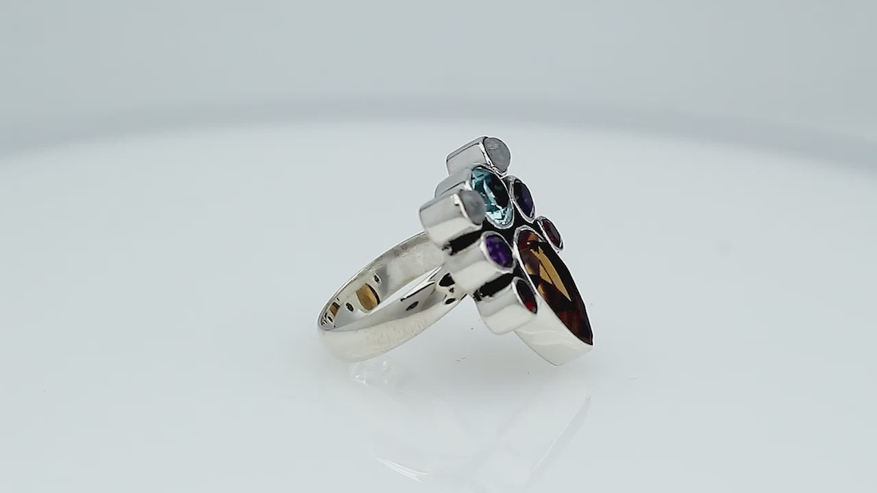 Sterling Silver handcrafted multi-stone ring with Blue Topaz, Amethyst, Citrine, Garnet, and Rainbow Moonstone wholesale from Bali, Indonesia