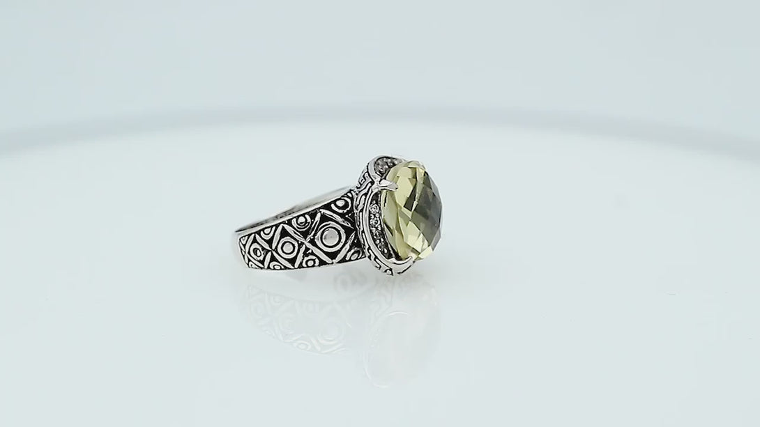 Wholesale sterling silver ring with cushion-cut Lemon Quartz and Balinese carvings, handcrafted in Bali.