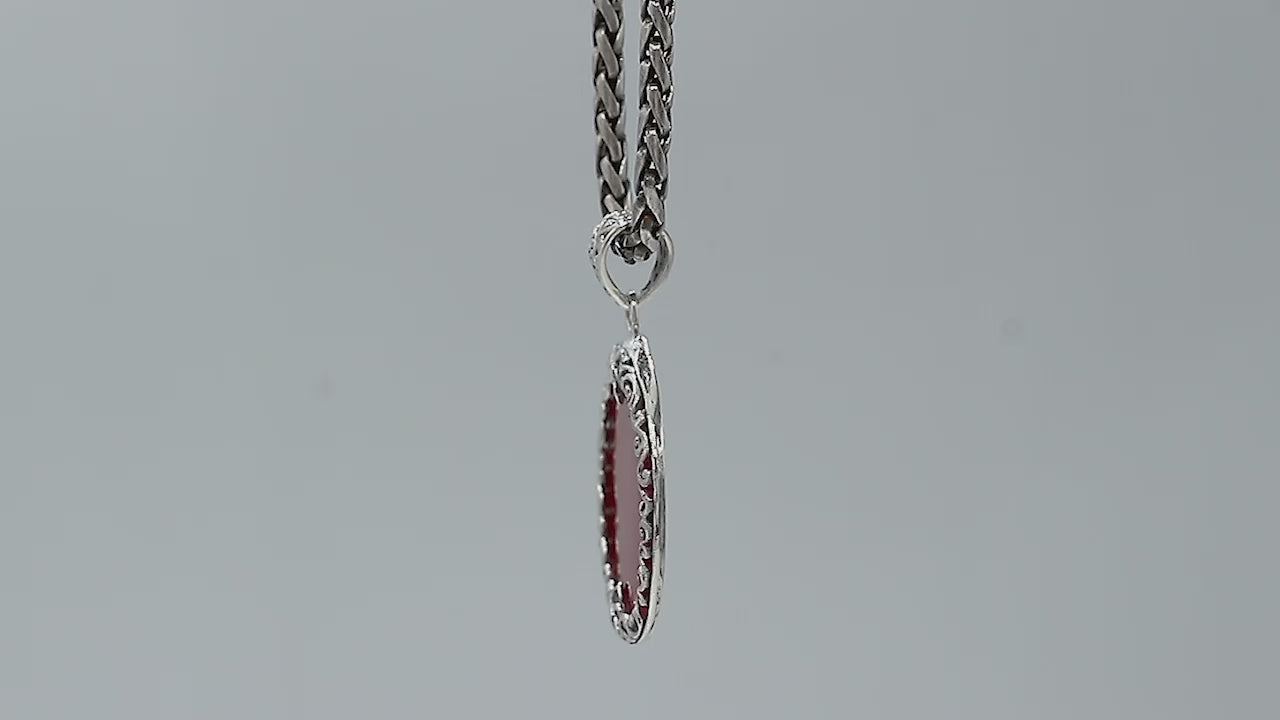 Sterling silver wholesale pendant with round coral gemstone, floral frame design, handcrafted Bali jewelry