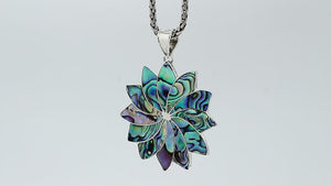 Sterling silver flower pendant with genuine Abalone Shell, handcrafted in Bali with multi-petal design – wholesale gemstone jewelry supplier.