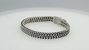 Sterling silver woven chain bracelet with geometric patterned clasp handcrafted in Bali