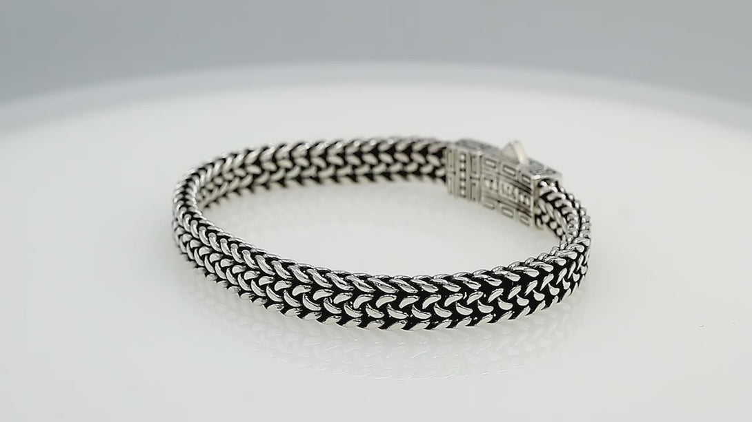 Sterling silver woven chain bracelet with geometric patterned clasp handcrafted in Bali
