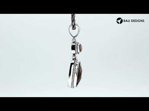 Sterling Silver Pendant Featuring Citrine And Smoky Quartz In Rope-Edge Bezel Frames.