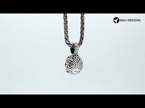 Sterling silver Mabe Pearl pendant with Balinese filigree and polished finish.