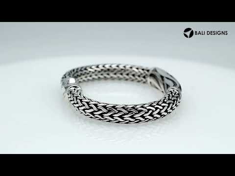 Wholesale sterling silver Bali woven bracelet featuring an engraved centerpiece and artistic push clasp, crafted for premium bulk jewelry inventory and luxury retail programs.