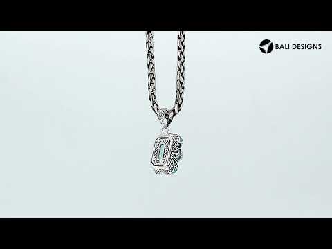 Blue Topaz Quartz emerald-cut pendant crafted in polished 925 sterling silver with decorative filigree side detailing and a refined structure for wholesale buyers
