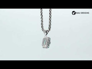 Blue Topaz Quartz emerald-cut pendant crafted in polished 925 sterling silver with decorative filigree side detailing and a refined structure for wholesale buyers