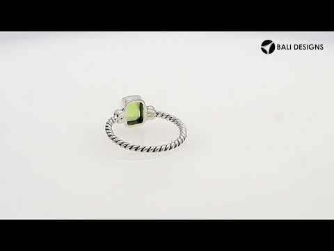 Wholesale sterling silver twisted band ring with rectangular-cut Peridot Quartz, handcrafted artisan jewelry in bulk for retailers and resellers.