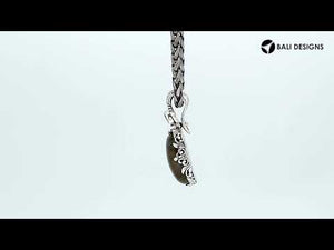 Wholesale sterling silver Labradorite and Blue Topaz Quartz pendant with Balinese handicraft design and antique finish handcrafted in Bali