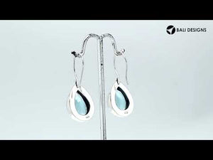 Sterling Silver pear-cut Amethyst Quartz hook earrings handcrafted in Bali with a smooth bezel setting and polished finish.