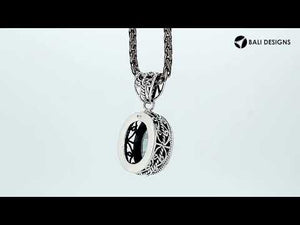 Sterling Silver Mystic Quartz Oval Pendant With Balinese Filigree Detailing.