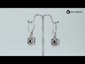 Wholesale sterling silver Black Onyx oval drop earrings with oxidized pattern and mirror-polished finish.