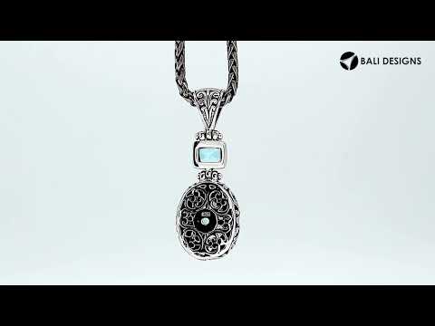 Wholesale sterling silver Blue Topaz pendant with oval and square gemstones, handcrafted Bali filigree design and oxidized finish, artisan jewelry for bulk orders.
