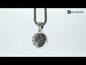 Sterling silver round pendant with Balinese scrollwork design, wholesale artisan jewelry.