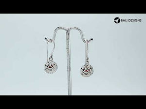 Sterling silver round-shaped Garnet earrings with ornamental side detailing and earwire lock, designed for wholesale jewelry distributors and professional retail collections.
