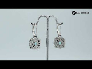Wholesale sterling silver Blue Topaz Quartz cushion drop earrings with polished finish and earwire lock.