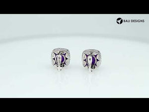 A pair of sterling silver cushion-cut Amethyst Quartz earrings with intricate side detailing and Omega clip locks, designed for bulk jewelry distribution and elegant catalog displays.