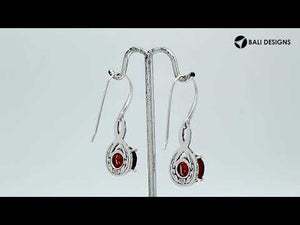 Wholesale Sterling Silver Garnet Quartz Round Infinity Earrings With Detailed Balinese-Style Metalwork.
