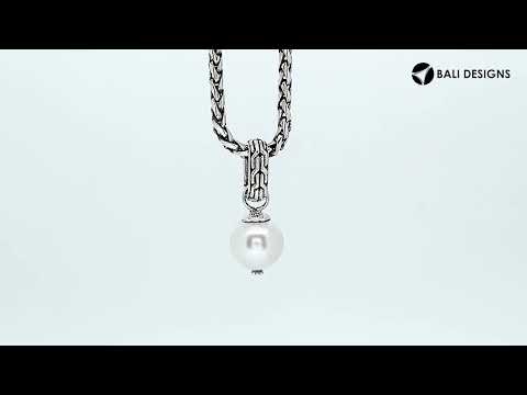 Sterling silver round drop pendant featuring a single Mabe Pearl and intricate Balinese silver detailing with mirror-polished finish.