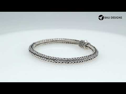 Sterling silver woven bracelet with polished surface and secure push clasp, featuring a classic rounded chain pattern for wholesale supply.
