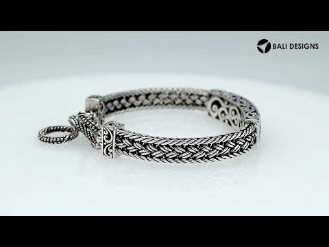 Sterling silver bracelet with Coral inlay and toggle lock handcrafted in Bali.