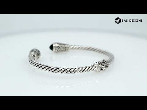 Sterling silver twisted bangle with green quartz ends and Balinese carvings, handcrafted in Bali