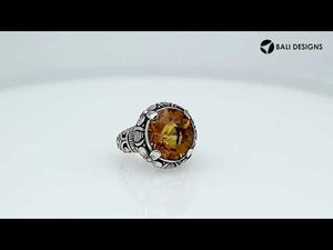 Sterling silver ring with round Citrine Quartz and Balinese floral carving design.