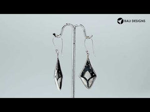 Sterling silver mother of pearl filigree diamond earrings with ornate silver design for wholesale jewelry buyers