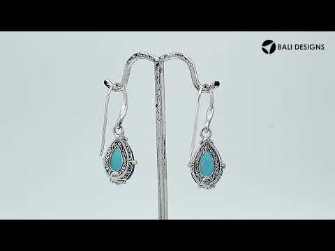 Wholesale Sterling Silver London Blue Topaz Quartz Teardrop Earrings With Detailed Balinese-Style Metalwork.