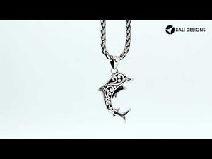 Sterling silver dolphin pendant with black shell inlay and traditional Balinese craftsmanship featuring a polished mirror finish.